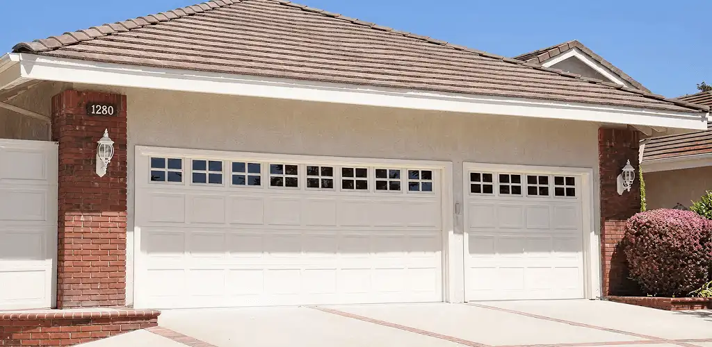Residential garage door repair service for a double garage door in Peoria, IL