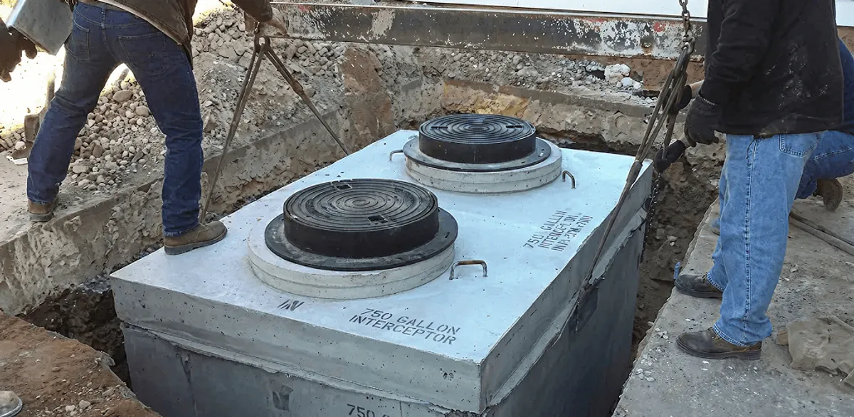 Grease trap installation for a commercial property drainage system in Peoria, IL