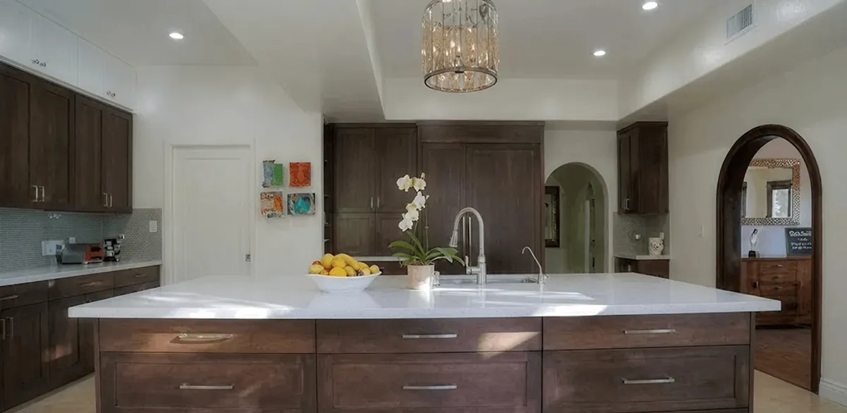 Cabinet refacing project with updated kitchen cabinets and island in Peoria, IL